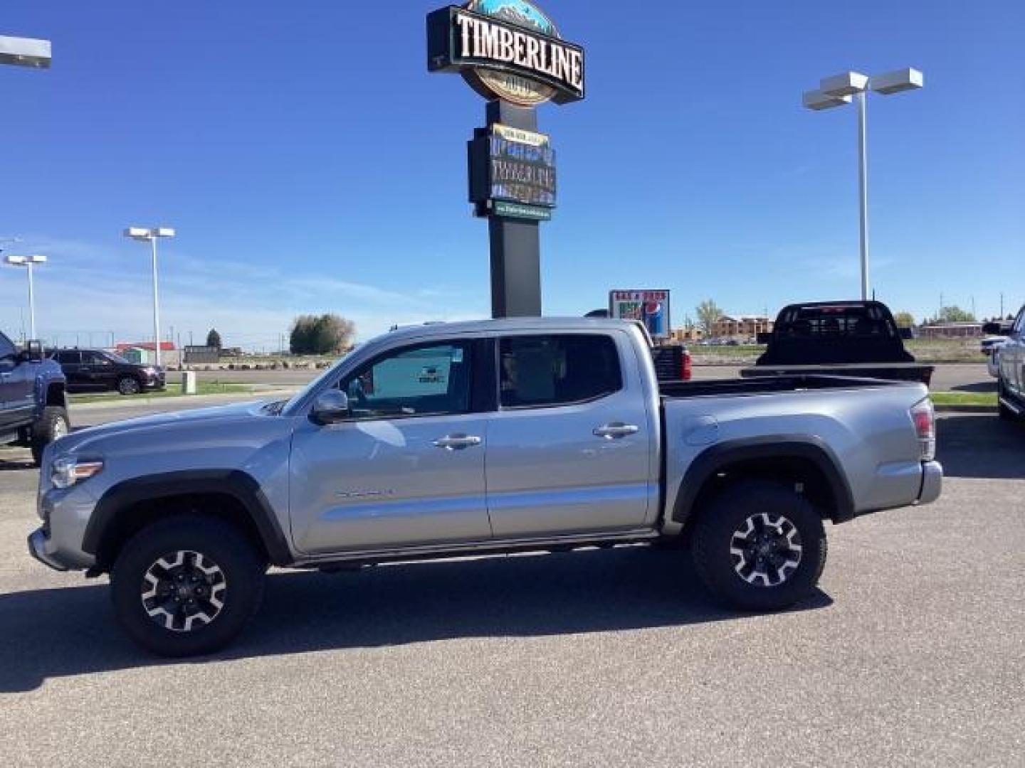 2021 Silver Sky Metallic /Cement Gray, cloth Toyota Tacoma SR5 Double Cab Long Bed V6 6AT 4WD (5TFCZ5ANXMX) with an 3.5L V6 DOHC 24V engine, 6-Speed Automatic transmission, located at 1235 N Woodruff Ave., Idaho Falls, 83401, (208) 523-1053, 43.507172, -112.000488 - The 2021 Toyota Tacoma Crew Cab is designed to excel both on and off the road, offering a combination of ruggedness, capability, and advanced features. Here are some of the key features you can typically find in this model: Off-Road Capability: The TRD Off-Road trim is specifically geared towards o - Photo#1