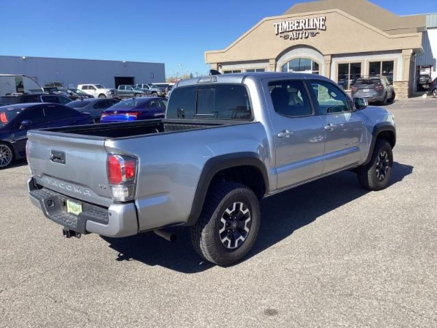 2021 Silver Sky Metallic /Cement Gray, cloth Toyota Tacoma SR5 Double Cab Long Bed V6 6AT 4WD (5TFCZ5ANXMX) with an 3.5L V6 DOHC 24V engine, 6-Speed Automatic transmission, located at 1235 N Woodruff Ave., Idaho Falls, 83401, (208) 523-1053, 43.507172, -112.000488 - The 2021 Toyota Tacoma Crew Cab is designed to excel both on and off the road, offering a combination of ruggedness, capability, and advanced features. Here are some of the key features you can typically find in this model: Off-Road Capability: The TRD Off-Road trim is specifically geared towards o - Photo#4