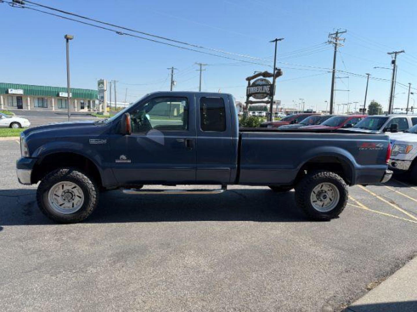 2005 BLUE /Medium Flint Leather Interior Ford F-350 SD (1FTWX31P55E) with an 60L V8 OHV 32V TURBO DIESEL engine, Automatic transmission, located at 1175 N Woodruff Ave, Idaho Falls, ID, 83401, 43.506901, -111.999657 - Photo#16