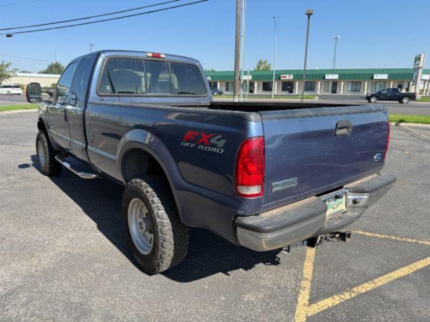 2005 BLUE /Medium Flint Leather Interior Ford F-350 SD (1FTWX31P55E) with an 60L V8 OHV 32V TURBO DIESEL engine, Automatic transmission, located at 1175 N Woodruff Ave, Idaho Falls, ID, 83401, 43.506901, -111.999657 - Photo#17