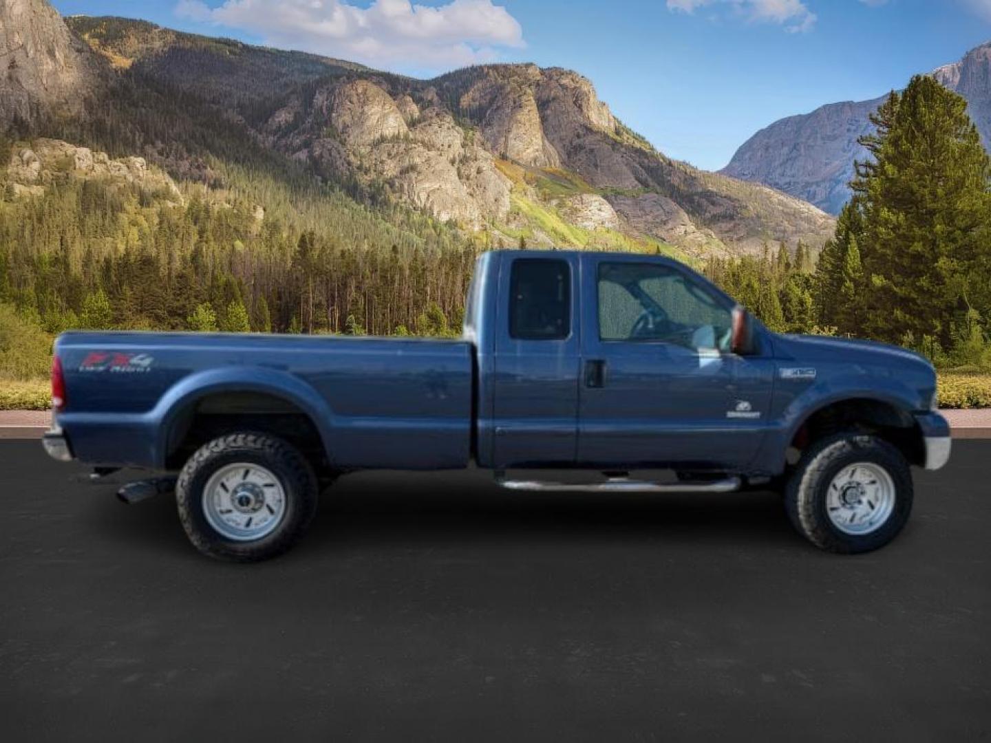 2005 BLUE /Medium Flint Leather Interior Ford F-350 SD (1FTWX31P55E) with an 60L V8 OHV 32V TURBO DIESEL engine, Automatic transmission, located at 1175 N Woodruff Ave, Idaho Falls, ID, 83401, 43.506901, -111.999657 - Photo#6