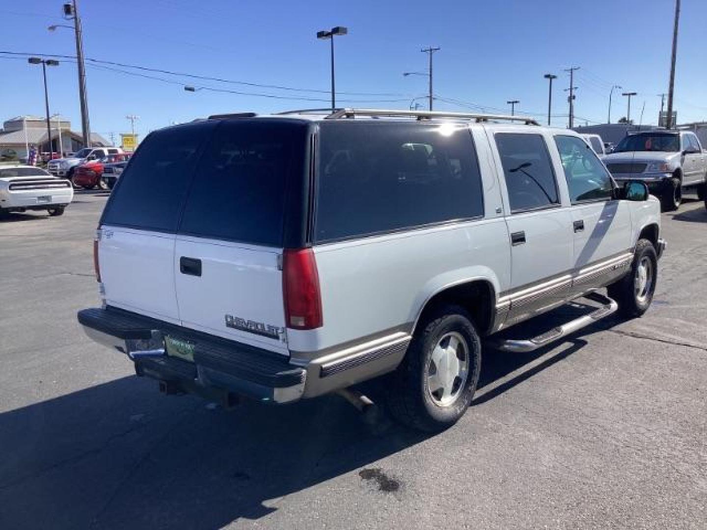 1999 Chevrolet Suburban K1500 4WD (1GNFK16R8XJ) with an 5.7L V8 OHV 16V engine, 4-Speed Automatic transmission, located at 1235 N Woodruff Ave., Idaho Falls, 83401, (208) 523-1053, 43.507172, -112.000488 - The 1999 Chevrolet Suburban LS was a rugged and versatile full-size SUV that offered a range of features suitable for families, towing, and outdoor activities. Here are some of the key features you might find on the 1999 Chevrolet Suburban LS: V8 Engine: Typically equipped with a powerful V8 engine - Photo#4