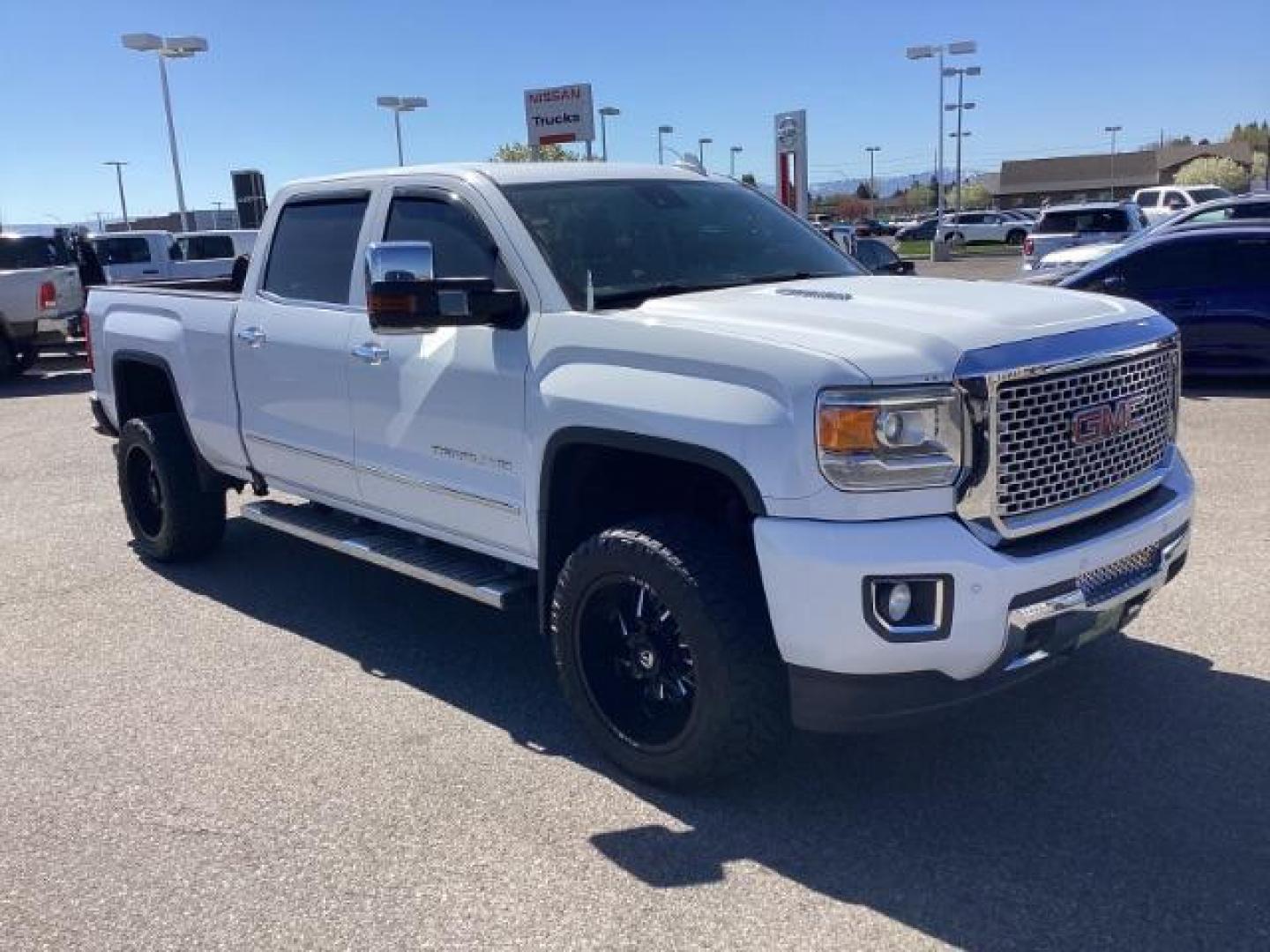 2016 Summit White /Cocoa/Dune, leather GMC Sierra 2500HD Denali Crew Cab 4WD (1GT12UE83GF) with an 6.6L V8 OHV 16 DIESEL engine, 6-Speed Automatic transmission, located at 1235 N Woodruff Ave., Idaho Falls, 83401, (208) 523-1053, 43.507172, -112.000488 - The 2016 GMC Sierra Denali 6.6L typically offers a combination of power, luxury, and capability. Here are some of the key features you can expect to find in this model: Engine: The 6.6-liter V8 turbo diesel engine is one of the standout features of the Sierra Denali. This engine delivers robust per - Photo#6