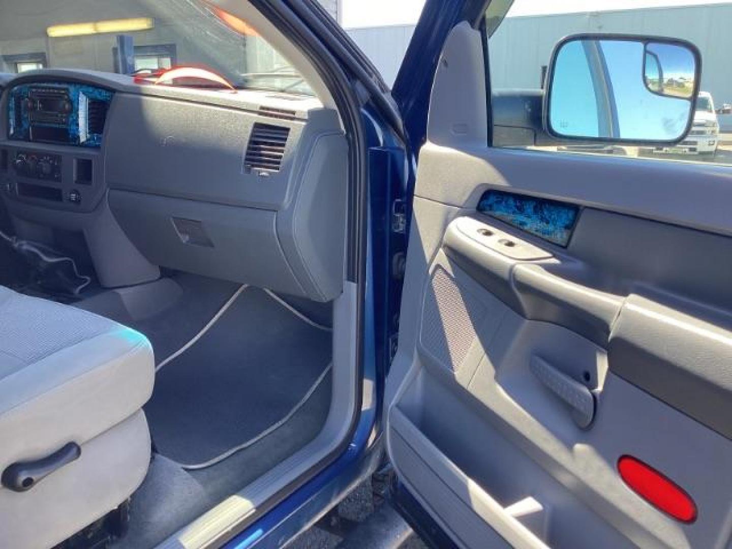 2006 Atlantic Blue Pearlcoat /Medium Slate Gray Cloth Interior Dodge Ram 2500 SLT Quad Cab 4WD (3D7KS28C36G) with an 5.9L L6 OHV 24V TURBO DIESEL engine, 6-Speed Manual transmission, located at 1235 N Woodruff Ave., Idaho Falls, 83401, (208) 523-1053, 43.507172, -112.000488 - Photo#19