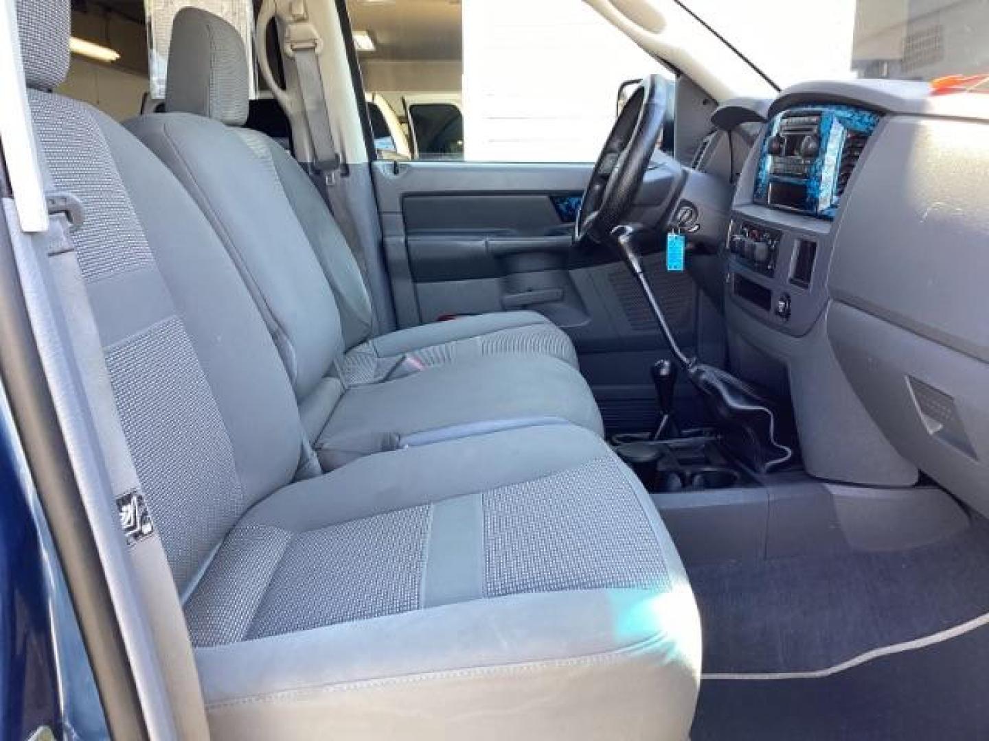 2006 Atlantic Blue Pearlcoat /Medium Slate Gray Cloth Interior Dodge Ram 2500 SLT Quad Cab 4WD (3D7KS28C36G) with an 5.9L L6 OHV 24V TURBO DIESEL engine, 6-Speed Manual transmission, located at 1235 N Woodruff Ave., Idaho Falls, 83401, (208) 523-1053, 43.507172, -112.000488 - Photo#21