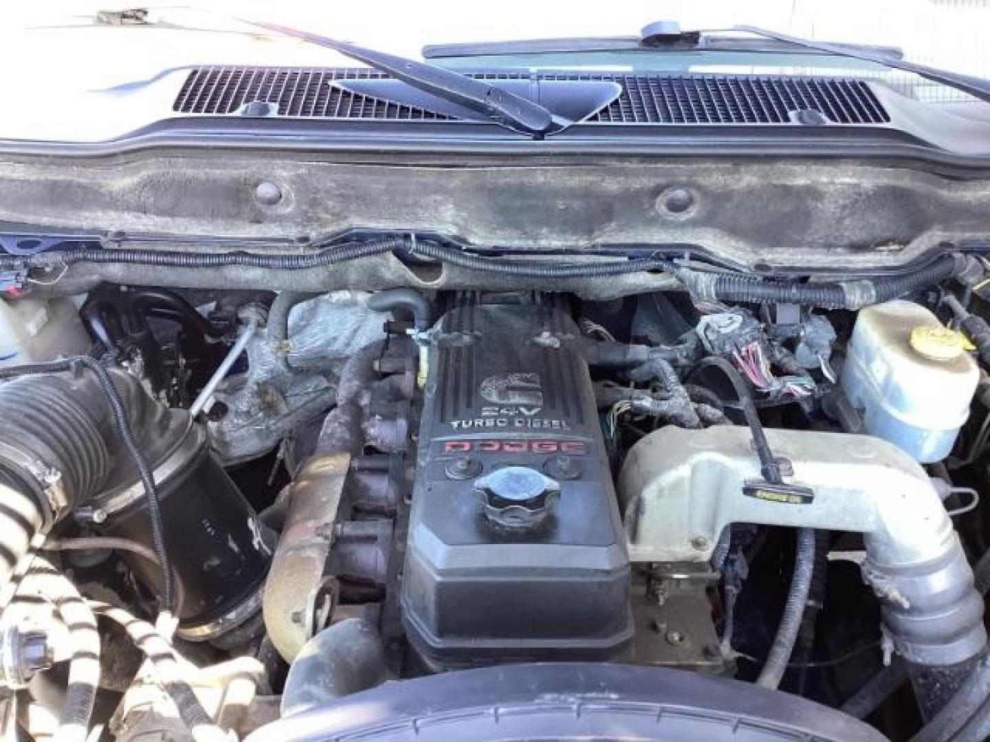 2006 Atlantic Blue Pearlcoat /Medium Slate Gray Cloth Interior Dodge Ram 2500 SLT Quad Cab 4WD (3D7KS28C36G) with an 5.9L L6 OHV 24V TURBO DIESEL engine, 6-Speed Manual transmission, located at 1235 N Woodruff Ave., Idaho Falls, 83401, (208) 523-1053, 43.507172, -112.000488 - Photo#24