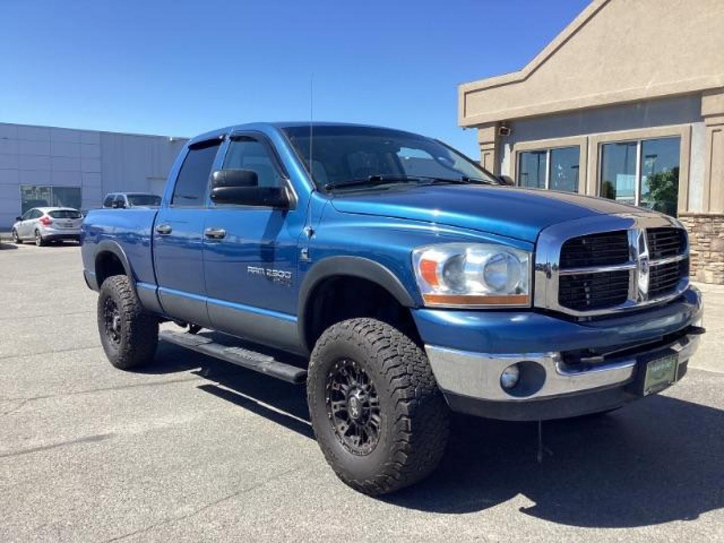 2006 Atlantic Blue Pearlcoat /Medium Slate Gray Cloth Interior Dodge Ram 2500 SLT Quad Cab 4WD (3D7KS28C36G) with an 5.9L L6 OHV 24V TURBO DIESEL engine, 6-Speed Manual transmission, located at 1235 N Woodruff Ave., Idaho Falls, 83401, (208) 523-1053, 43.507172, -112.000488 - Photo#6