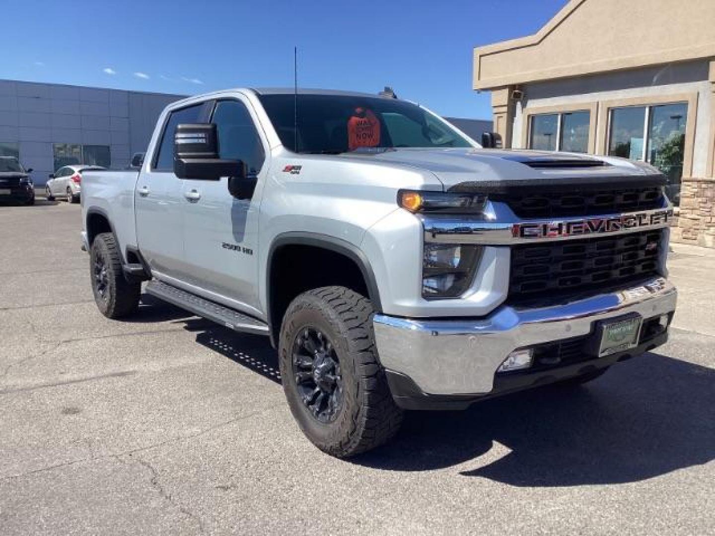 2021 SILVER /Jet Black, leather Chevrolet Silverado 2500HD LT Crew Cab Short Box 4WD (1GC4YNEY1MF) with an 6.6L V8 OHV 16V DIESEL engine, 6-Speed Automatic transmission, located at 1235 N Woodruff Ave., Idaho Falls, 83401, (208) 523-1053, 43.507172, -112.000488 - Photo#6