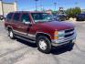 1999 Victory Red /Gray Leather Chevrolet Tahoe 4-Door 4WD (1GNEK13R6XJ) with an 5.7L V8 OHV 16V engine, 4-Speed Automatic transmission, located at 1235 N Woodruff Ave., Idaho Falls, 83401, (208) 523-1053, 43.507172, -112.000488 - The 1999 Chevrolet Tahoe is a full-size SUV known for its rugged performance, spacious interior, and towing capability. Here are the key features of the 1999 Chevrolet Tahoe: Engine and Performance Engine Options: 5.7-liter V8: Produces 255 horsepower and 330 lb-ft of torque. Transmission: 4-speed - Photo#4