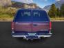 1999 Victory Red /Gray Leather Chevrolet Tahoe 4-Door 4WD (1GNEK13R6XJ) with an 5.7L V8 OHV 16V engine, 4-Speed Automatic transmission, located at 1235 N Woodruff Ave., Idaho Falls, 83401, (208) 523-1053, 43.507172, -112.000488 - The 1999 Chevrolet Tahoe is a full-size SUV known for its rugged performance, spacious interior, and towing capability. Here are the key features of the 1999 Chevrolet Tahoe: Engine and Performance Engine Options: 5.7-liter V8: Produces 255 horsepower and 330 lb-ft of torque. Transmission: 4-speed - Photo#3
