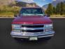 1999 Victory Red /Gray Leather Chevrolet Tahoe 4-Door 4WD (1GNEK13R6XJ) with an 5.7L V8 OHV 16V engine, 4-Speed Automatic transmission, located at 1235 N Woodruff Ave., Idaho Falls, 83401, (208) 523-1053, 43.507172, -112.000488 - The 1999 Chevrolet Tahoe is a full-size SUV known for its rugged performance, spacious interior, and towing capability. Here are the key features of the 1999 Chevrolet Tahoe: Engine and Performance Engine Options: 5.7-liter V8: Produces 255 horsepower and 330 lb-ft of torque. Transmission: 4-speed - Photo#7