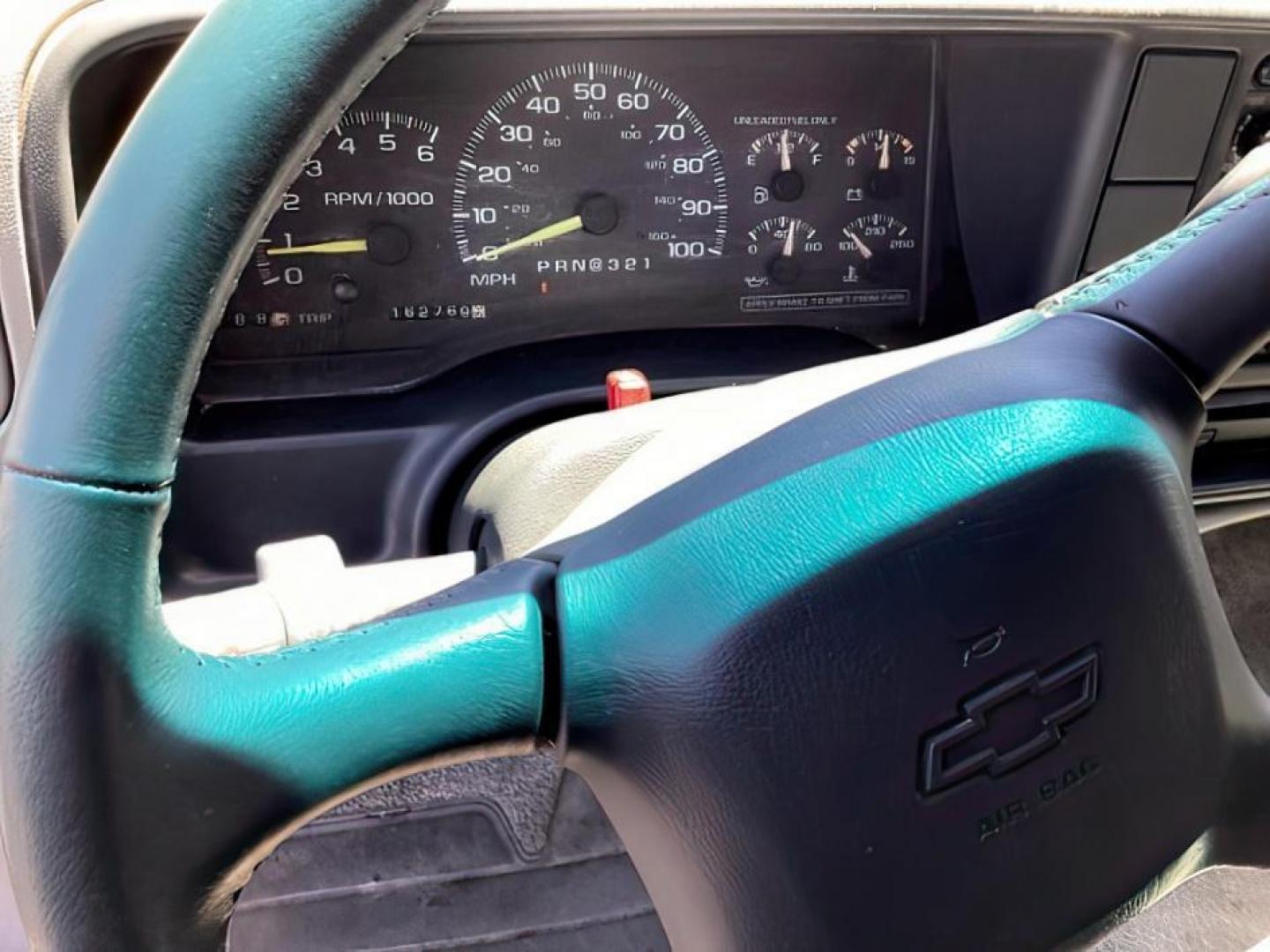 1999 Victory Red /Gray Leather Chevrolet Tahoe 4-Door 4WD (1GNEK13R6XJ) with an 5.7L V8 OHV 16V engine, 4-Speed Automatic transmission, located at 1235 N Woodruff Ave., Idaho Falls, 83401, (208) 523-1053, 43.507172, -112.000488 - The 1999 Chevrolet Tahoe is a full-size SUV known for its rugged performance, spacious interior, and towing capability. Here are the key features of the 1999 Chevrolet Tahoe: Engine and Performance Engine Options: 5.7-liter V8: Produces 255 horsepower and 330 lb-ft of torque. Transmission: 4-speed - Photo#10