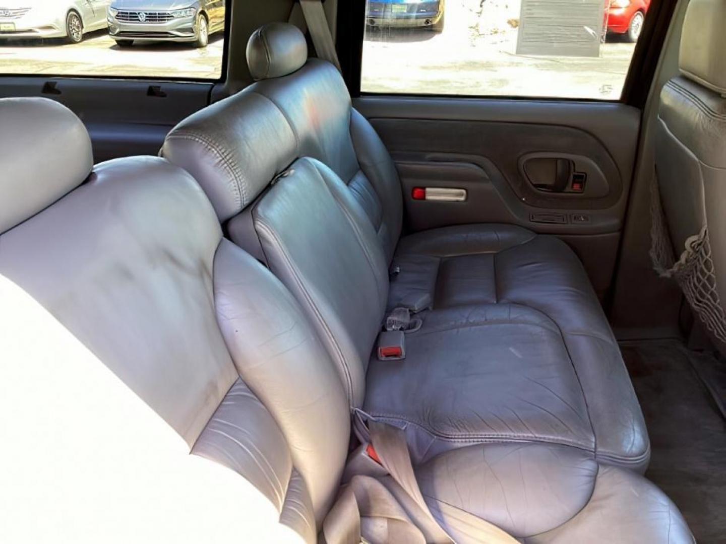 1999 Victory Red /Gray Leather Chevrolet Tahoe 4-Door 4WD (1GNEK13R6XJ) with an 5.7L V8 OHV 16V engine, 4-Speed Automatic transmission, located at 1235 N Woodruff Ave., Idaho Falls, 83401, (208) 523-1053, 43.507172, -112.000488 - The 1999 Chevrolet Tahoe is a full-size SUV known for its rugged performance, spacious interior, and towing capability. Here are the key features of the 1999 Chevrolet Tahoe: Engine and Performance Engine Options: 5.7-liter V8: Produces 255 horsepower and 330 lb-ft of torque. Transmission: 4-speed - Photo#12