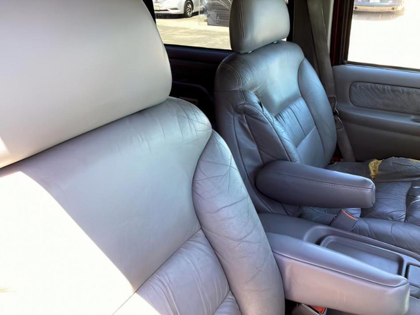 1999 Victory Red /Gray Leather Chevrolet Tahoe 4-Door 4WD (1GNEK13R6XJ) with an 5.7L V8 OHV 16V engine, 4-Speed Automatic transmission, located at 1235 N Woodruff Ave., Idaho Falls, 83401, (208) 523-1053, 43.507172, -112.000488 - The 1999 Chevrolet Tahoe is a full-size SUV known for its rugged performance, spacious interior, and towing capability. Here are the key features of the 1999 Chevrolet Tahoe: Engine and Performance Engine Options: 5.7-liter V8: Produces 255 horsepower and 330 lb-ft of torque. Transmission: 4-speed - Photo#14