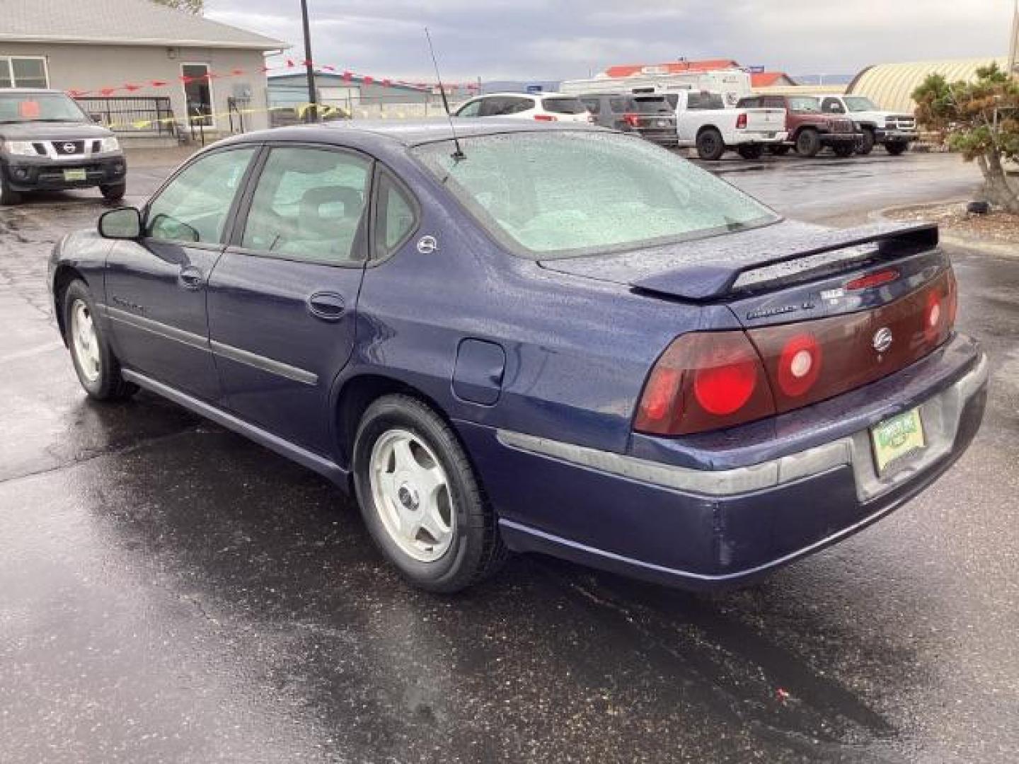 2001 Navy Blue Metallic /Medium Gray Cloth Chevrolet Impala LS (2G1WH55K519) with an 3.8L V6 OHV 12V engine, 4-Speed Automatic transmission, located at 1235 N Woodruff Ave., Idaho Falls, 83401, (208) 523-1053, 43.507172, -112.000488 - The 2001 Chevrolet Impala LS, a midsize sedan, typically came with several standard features and optional upgrades. Here are some common features found on the 2001 Chevrolet Impala LS: Engine: The Impala LS often featured a 3.8-liter V6 engine, which provided a good balance of power and fuel effici - Photo#2