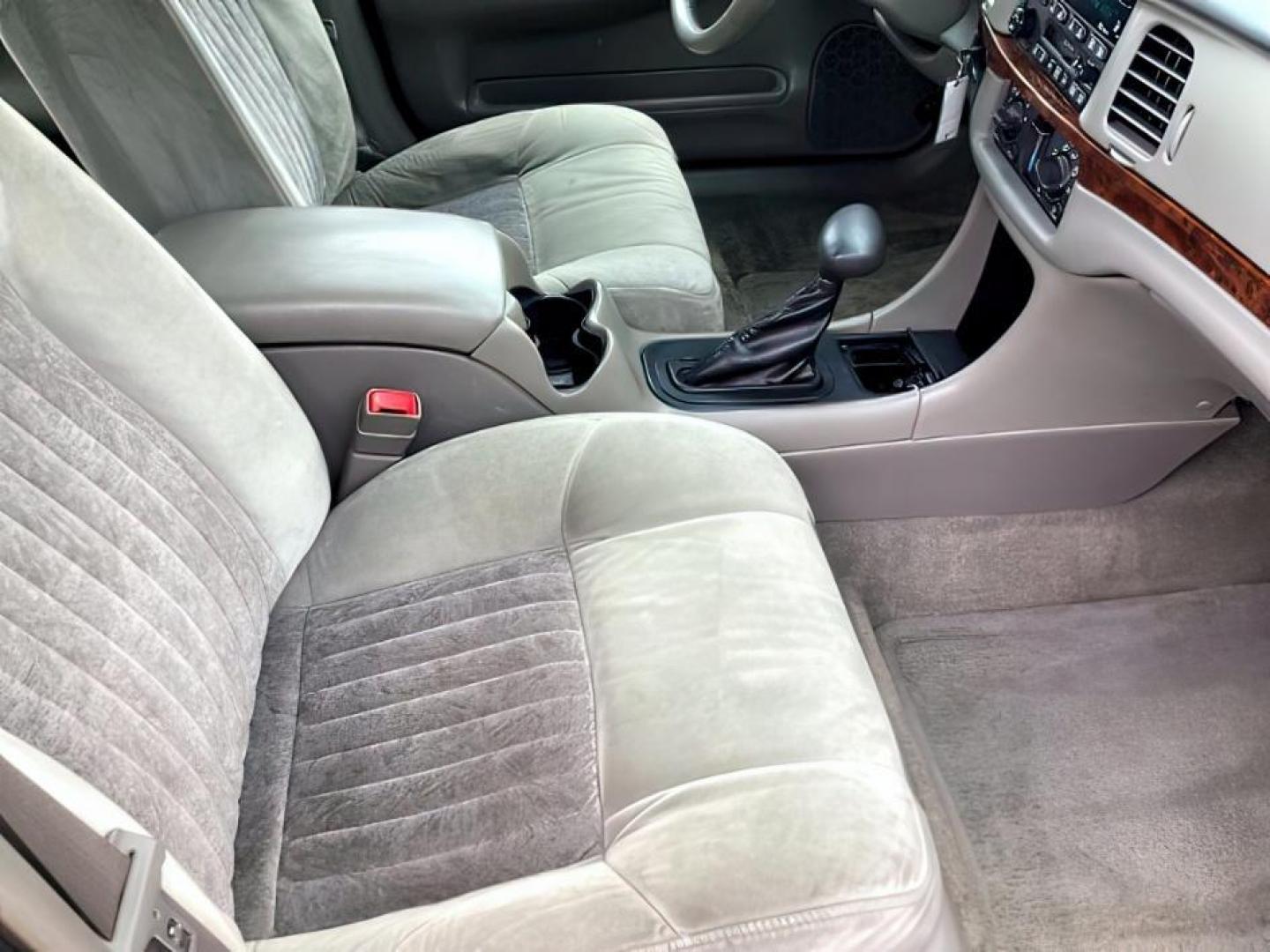 2001 Navy Blue Metallic /Medium Gray Cloth Chevrolet Impala LS (2G1WH55K519) with an 3.8L V6 OHV 12V engine, 4-Speed Automatic transmission, located at 1235 N Woodruff Ave., Idaho Falls, 83401, (208) 523-1053, 43.507172, -112.000488 - The 2001 Chevrolet Impala LS, a midsize sedan, typically came with several standard features and optional upgrades. Here are some common features found on the 2001 Chevrolet Impala LS: Engine: The Impala LS often featured a 3.8-liter V6 engine, which provided a good balance of power and fuel effici - Photo#17