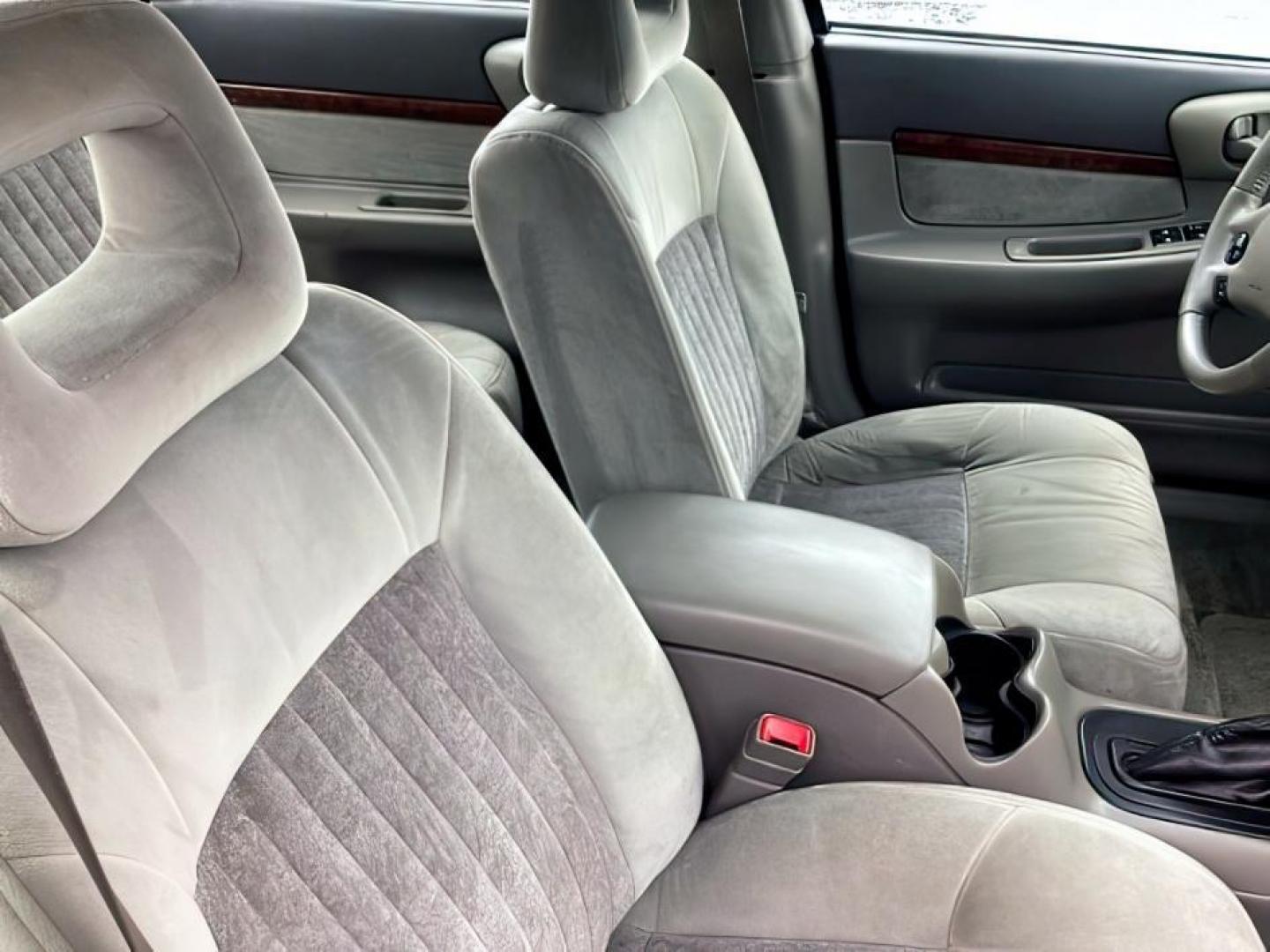 2001 Navy Blue Metallic /Medium Gray Cloth Chevrolet Impala LS (2G1WH55K519) with an 3.8L V6 OHV 12V engine, 4-Speed Automatic transmission, located at 1235 N Woodruff Ave., Idaho Falls, 83401, (208) 523-1053, 43.507172, -112.000488 - The 2001 Chevrolet Impala LS, a midsize sedan, typically came with several standard features and optional upgrades. Here are some common features found on the 2001 Chevrolet Impala LS: Engine: The Impala LS often featured a 3.8-liter V6 engine, which provided a good balance of power and fuel effici - Photo#18