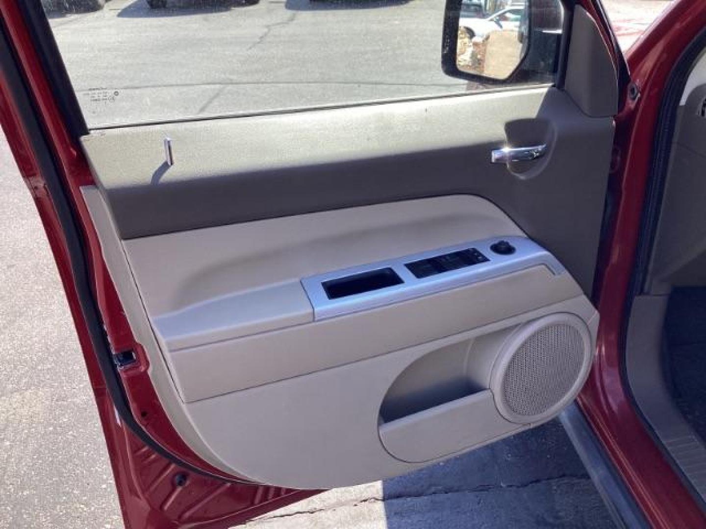 2008 Inferno Red Crystal Pearl /Dark Slate Gray Cloth Interior Jeep Patriot Sport 4WD (1J8FF28W28D) with an 2.4L L4 DOHC 16V engine, located at 1235 N Woodruff Ave., Idaho Falls, 83401, (208) 523-1053, 43.507172, -112.000488 - Photo#9