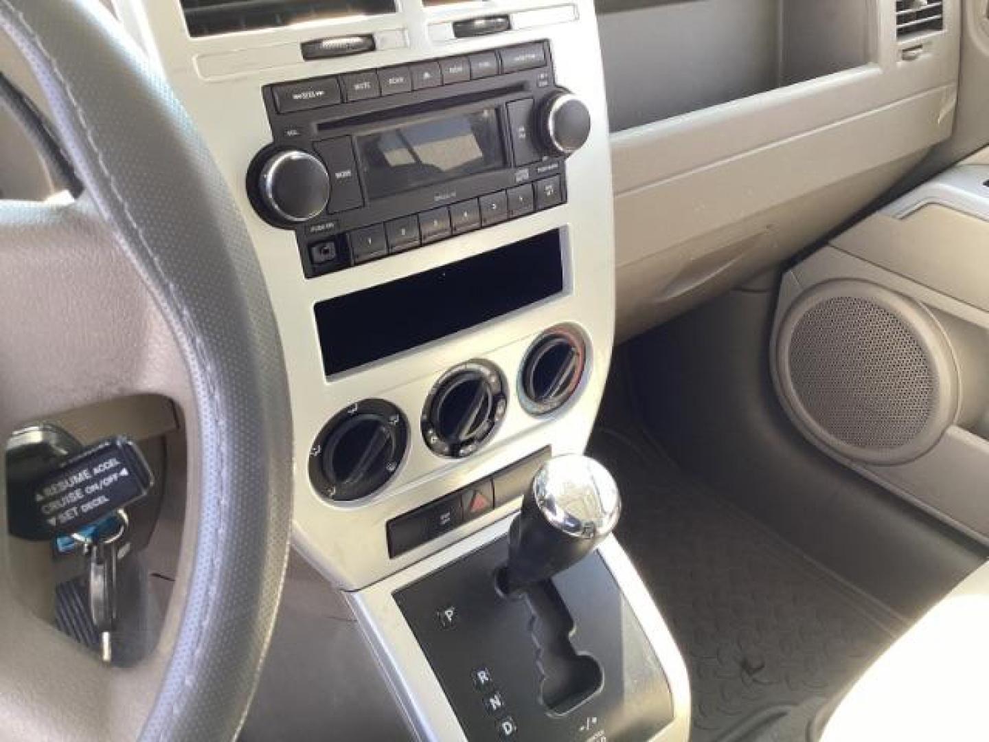 2008 Inferno Red Crystal Pearl /Dark Slate Gray Cloth Interior Jeep Patriot Sport 4WD (1J8FF28W28D) with an 2.4L L4 DOHC 16V engine, located at 1235 N Woodruff Ave., Idaho Falls, 83401, (208) 523-1053, 43.507172, -112.000488 - Photo#11