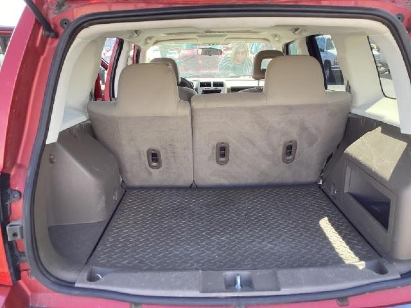 2008 Inferno Red Crystal Pearl /Dark Slate Gray Cloth Interior Jeep Patriot Sport 4WD (1J8FF28W28D) with an 2.4L L4 DOHC 16V engine, located at 1235 N Woodruff Ave., Idaho Falls, 83401, (208) 523-1053, 43.507172, -112.000488 - Photo#14