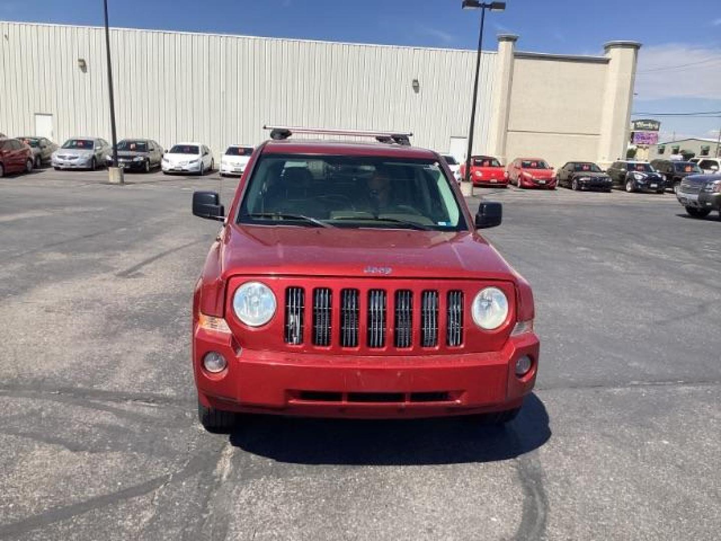 2008 Inferno Red Crystal Pearl /Dark Slate Gray Cloth Interior Jeep Patriot Sport 4WD (1J8FF28W28D) with an 2.4L L4 DOHC 16V engine, located at 1235 N Woodruff Ave., Idaho Falls, 83401, (208) 523-1053, 43.507172, -112.000488 - Photo#7