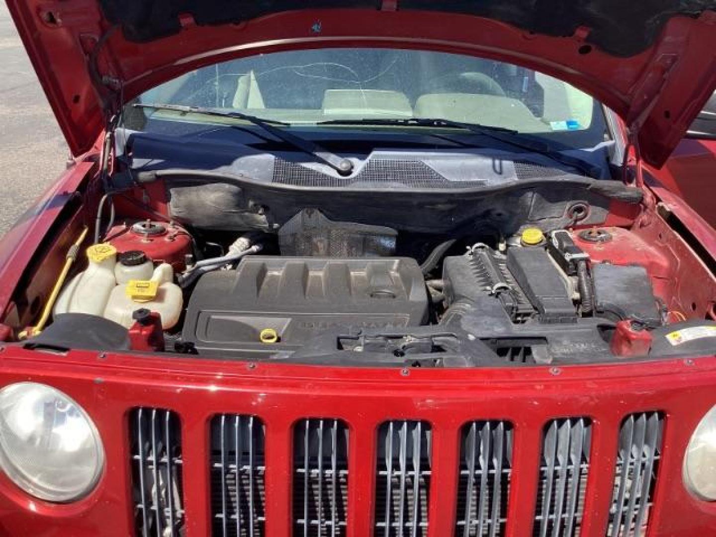 2008 Inferno Red Crystal Pearl /Dark Slate Gray Cloth Interior Jeep Patriot Sport 4WD (1J8FF28W28D) with an 2.4L L4 DOHC 16V engine, located at 1235 N Woodruff Ave., Idaho Falls, 83401, (208) 523-1053, 43.507172, -112.000488 - Photo#8