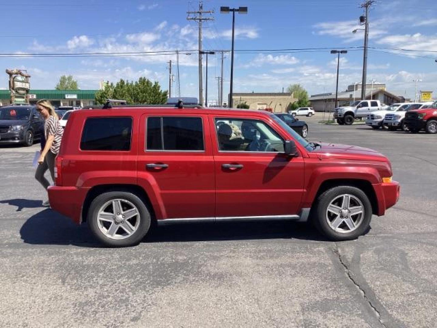 2008 Inferno Red Crystal Pearl /Dark Slate Gray Cloth Interior Jeep Patriot Sport 4WD (1J8FF28W28D) with an 2.4L L4 DOHC 16V engine, located at 1235 N Woodruff Ave., Idaho Falls, 83401, (208) 523-1053, 43.507172, -112.000488 - Photo#5