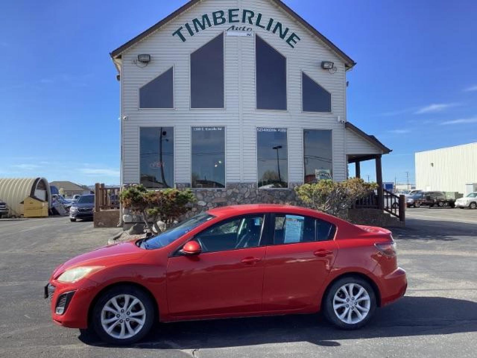 2010 Velocity Red Mica Mazda MAZDA3 s Sport 4-Door (JM1BL1S69A1) with an 2.5L L4 DOHC 16V engine, located at 1235 N Woodruff Ave., Idaho Falls, 83401, (208) 523-1053, 43.507172, -112.000488 - The 2010 Mazda 3 sedan typically comes with a range of features, varying across different trim levels. Here are some common features you might find: Engine Options: The 2010 Mazda 3 sedan may have different engine options, including a 2.0-liter inline-four engine or a 2.5-liter inline-four engine, - Photo #1