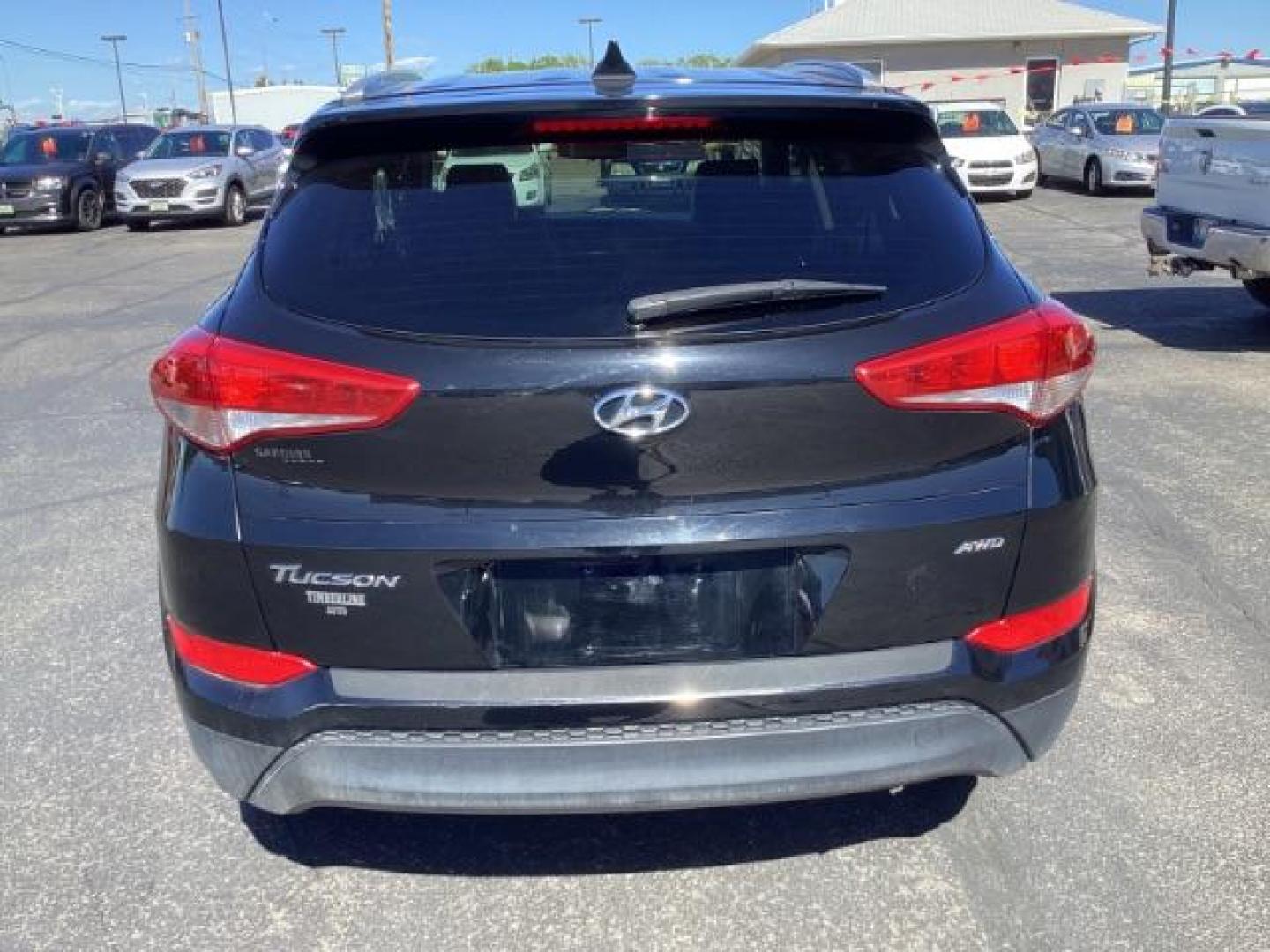 2018 Black Noir Pearl /Black, cloth Hyundai Tucson SEL AWD (KM8J3CA40JU) with an 2.0L L4 DOHC 16V engine, 6-Speed Automatic transmission, located at 1235 N Woodruff Ave., Idaho Falls, 83401, (208) 523-1053, 43.507172, -112.000488 - At Timberline Auto it is always easy to find a great deal on your next vehicle! Our experienced sales staff can help find the right vehicle will fit your needs. Our knowledgeable finance department has options for almost any credit score. We offer many warranty contract options to protect you new pr - Photo#0