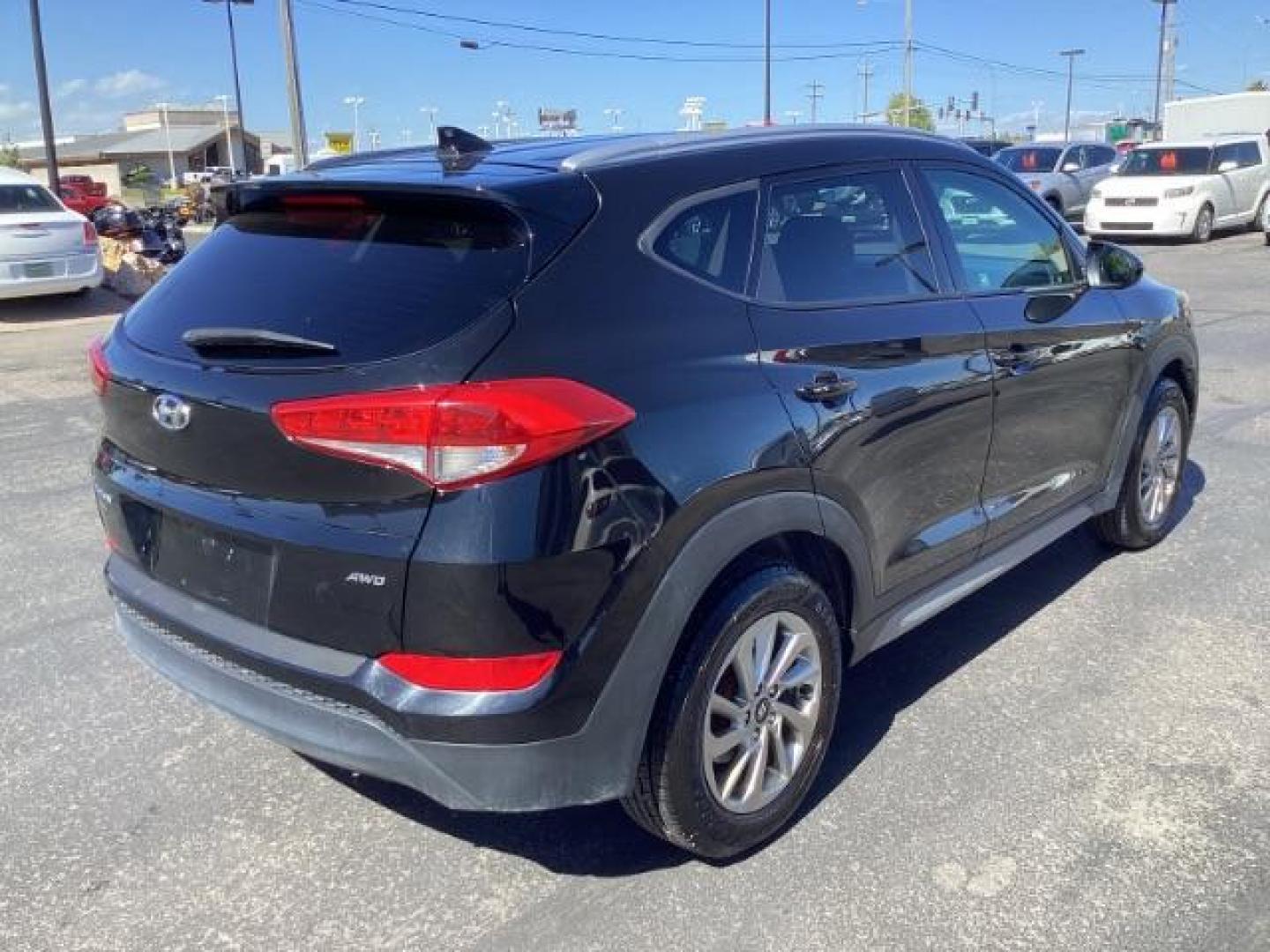 2018 Black Noir Pearl /Black, cloth Hyundai Tucson SEL AWD (KM8J3CA40JU) with an 2.0L L4 DOHC 16V engine, 6-Speed Automatic transmission, located at 1235 N Woodruff Ave., Idaho Falls, 83401, (208) 523-1053, 43.507172, -112.000488 - At Timberline Auto it is always easy to find a great deal on your next vehicle! Our experienced sales staff can help find the right vehicle will fit your needs. Our knowledgeable finance department has options for almost any credit score. We offer many warranty contract options to protect you new pr - Photo#4