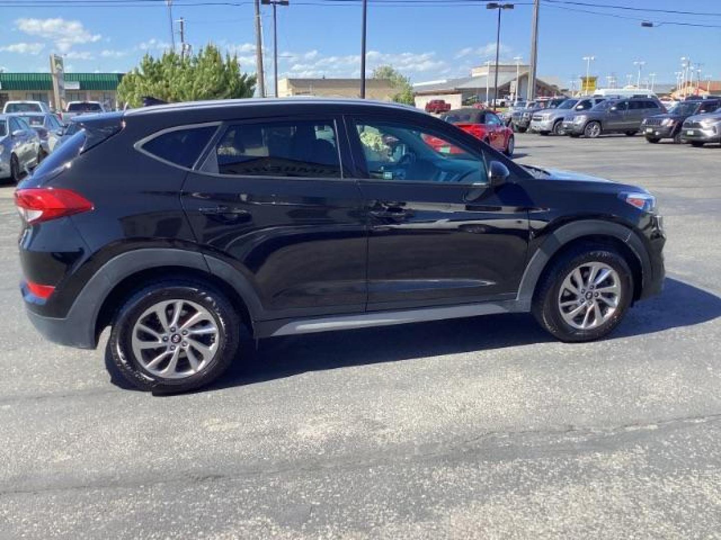 2018 Black Noir Pearl /Black, cloth Hyundai Tucson SEL AWD (KM8J3CA40JU) with an 2.0L L4 DOHC 16V engine, 6-Speed Automatic transmission, located at 1235 N Woodruff Ave., Idaho Falls, 83401, (208) 523-1053, 43.507172, -112.000488 - At Timberline Auto it is always easy to find a great deal on your next vehicle! Our experienced sales staff can help find the right vehicle will fit your needs. Our knowledgeable finance department has options for almost any credit score. We offer many warranty contract options to protect you new pr - Photo#5