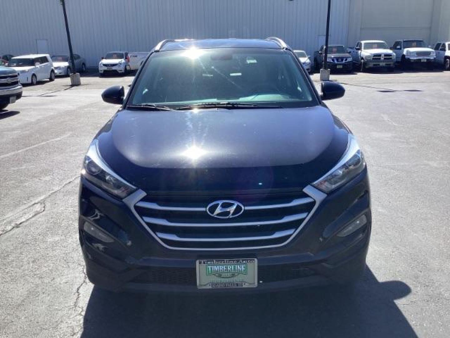 2018 Black Noir Pearl /Black, cloth Hyundai Tucson SEL AWD (KM8J3CA40JU) with an 2.0L L4 DOHC 16V engine, 6-Speed Automatic transmission, located at 1235 N Woodruff Ave., Idaho Falls, 83401, (208) 523-1053, 43.507172, -112.000488 - At Timberline Auto it is always easy to find a great deal on your next vehicle! Our experienced sales staff can help find the right vehicle will fit your needs. Our knowledgeable finance department has options for almost any credit score. We offer many warranty contract options to protect you new pr - Photo#7