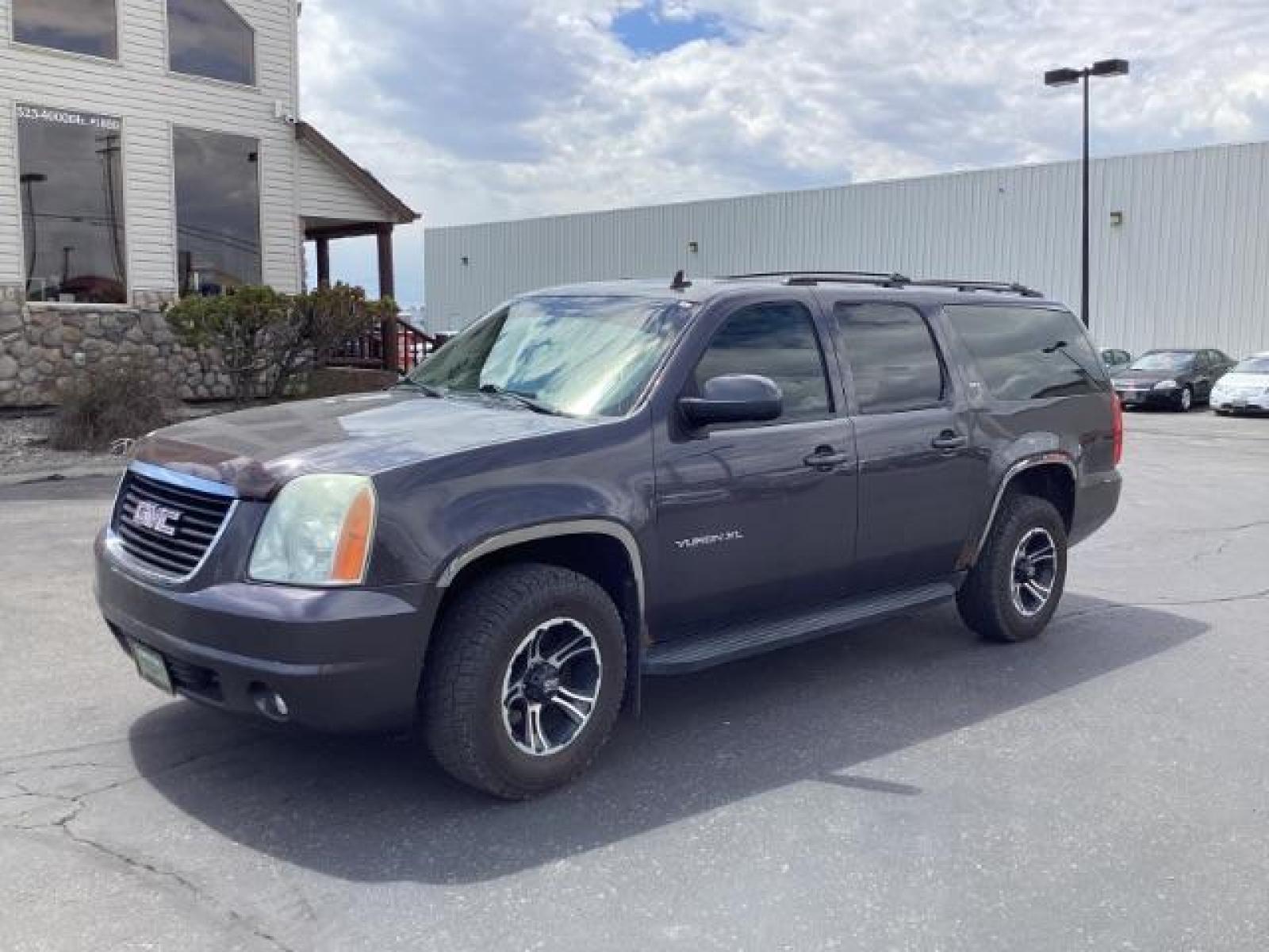 2011 GREY /Ebony Leather Interior GMC Yukon XL SLT-1 1/2 Ton 4WD (1GKS2LE30BR) with an 5.3L V8 OHV 16V FFV engine, 6-Speed Automatic transmission, located at 1235 N Woodruff Ave., Idaho Falls, 83401, (208) 523-1053, 43.507172, -112.000488 - Photo #0