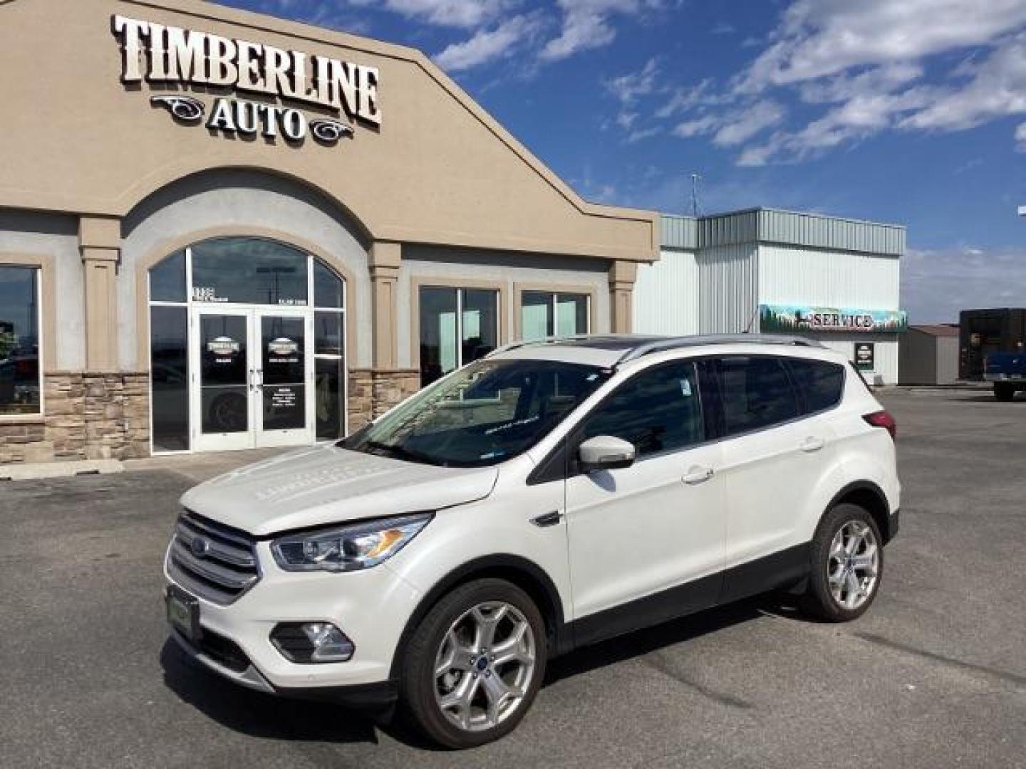 2019 White Platinum Tri-Coat Metallic /Charcoal Black, leather/cloth Ford Escape Titanium 4WD (1FMCU9J97KU) with an 2.0L L4 DOHC 16V engine, 6-Speed Automatic transmission, located at 1235 N Woodruff Ave., Idaho Falls, 83401, (208) 523-1053, 43.507172, -112.000488 - Photo#0