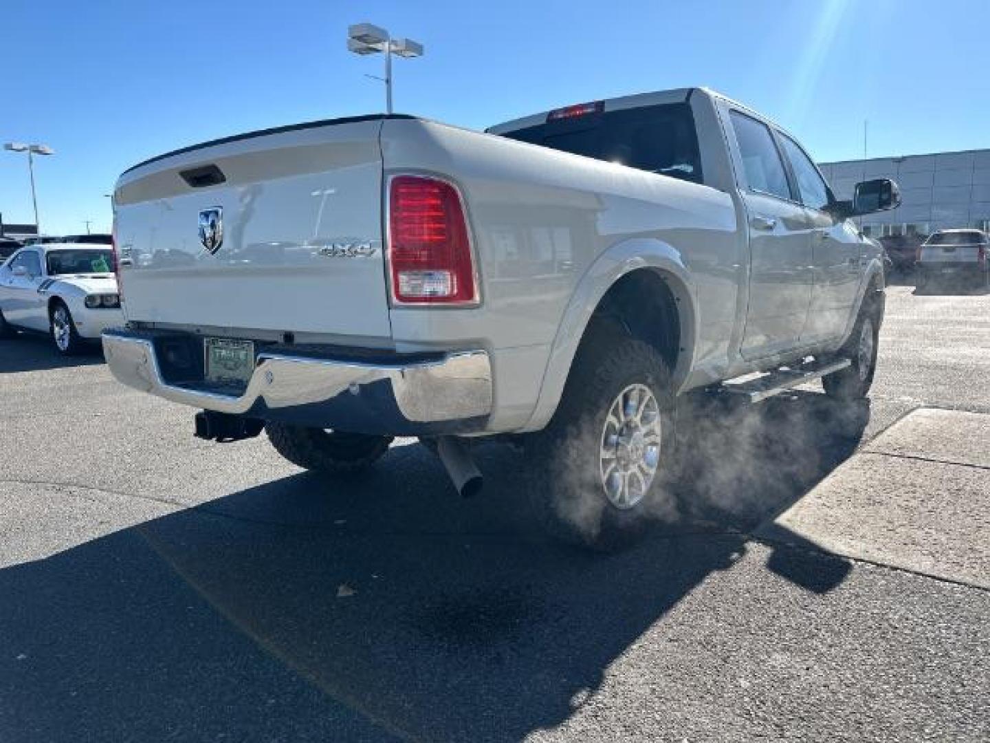 2017 WHITE /Black, leather RAM 2500 Laramie Crew Cab SWB 4WD (3C6UR5FJ6HG) with an 6.4L V8 engine, 6-Speed Automatic transmission, located at 1235 N Woodruff Ave., Idaho Falls, 83401, (208) 523-1053, 43.507172, -112.000488 - At Timberline Auto, finding a great deal on your next vehicle is always easy! Our experienced sales staff's goal is to help find you the right vehicle at the right price! Our knowledgeable finance department has options for almost any credit score. We offer extended service contract options to prote - Photo#5