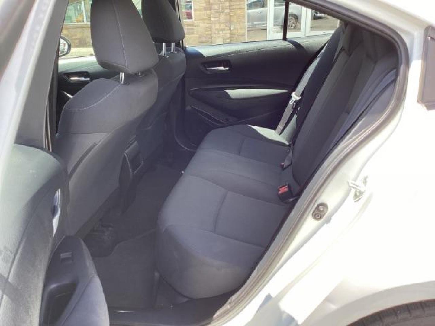 2021 WHITE /CLOTH Toyota Corolla LE (5YFEPMAE1MP) with an 1.8L L4 DOHC 16V engine, Continuously Variable Transmission transmission, located at 1235 N Woodruff Ave., Idaho Falls, 83401, (208) 523-1053, 43.507172, -112.000488 - Photo#17