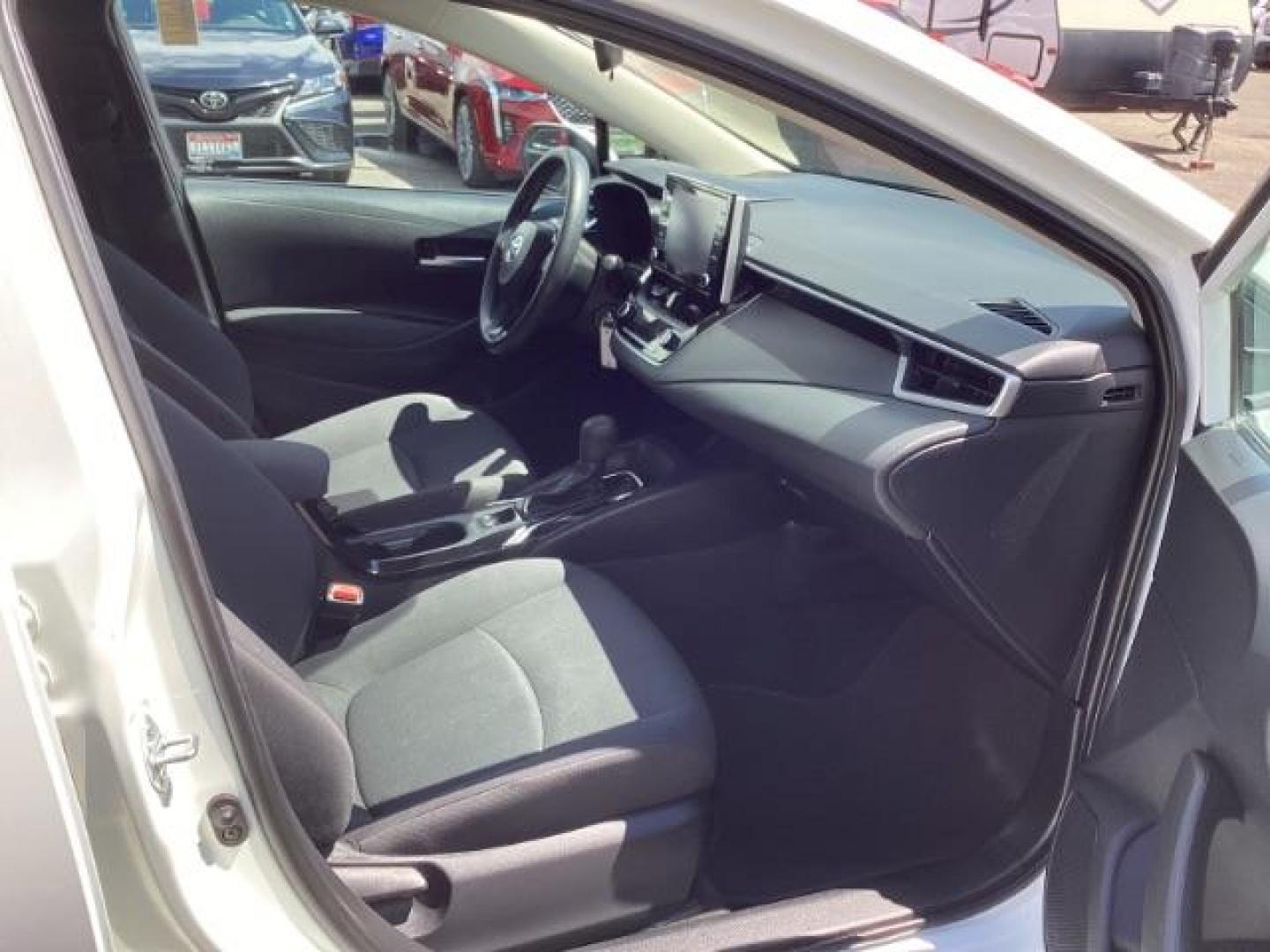 2021 WHITE /CLOTH Toyota Corolla LE (5YFEPMAE1MP) with an 1.8L L4 DOHC 16V engine, Continuously Variable Transmission transmission, located at 1235 N Woodruff Ave., Idaho Falls, 83401, (208) 523-1053, 43.507172, -112.000488 - Photo#19