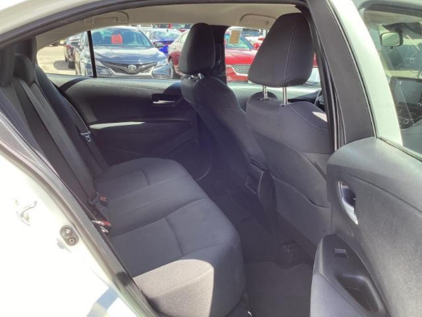 2021 WHITE /CLOTH Toyota Corolla LE (5YFEPMAE1MP) with an 1.8L L4 DOHC 16V engine, Continuously Variable Transmission transmission, located at 1235 N Woodruff Ave., Idaho Falls, 83401, (208) 523-1053, 43.507172, -112.000488 - Photo#20