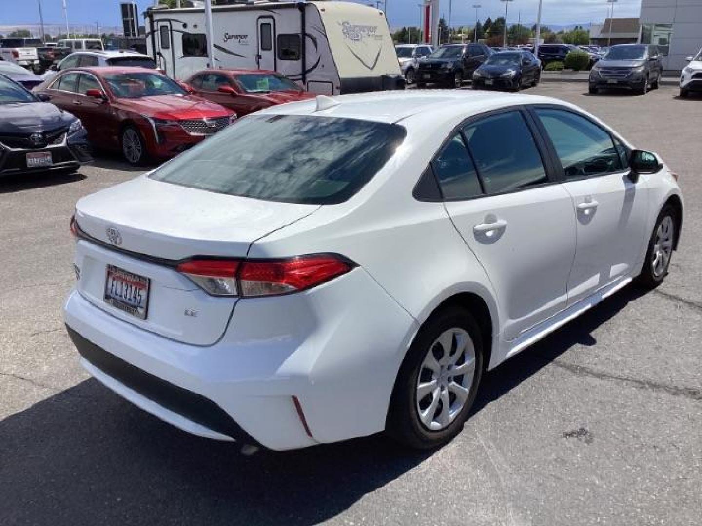 2021 WHITE /CLOTH Toyota Corolla LE (5YFEPMAE1MP) with an 1.8L L4 DOHC 16V engine, Continuously Variable Transmission transmission, located at 1235 N Woodruff Ave., Idaho Falls, 83401, (208) 523-1053, 43.507172, -112.000488 - Photo#5