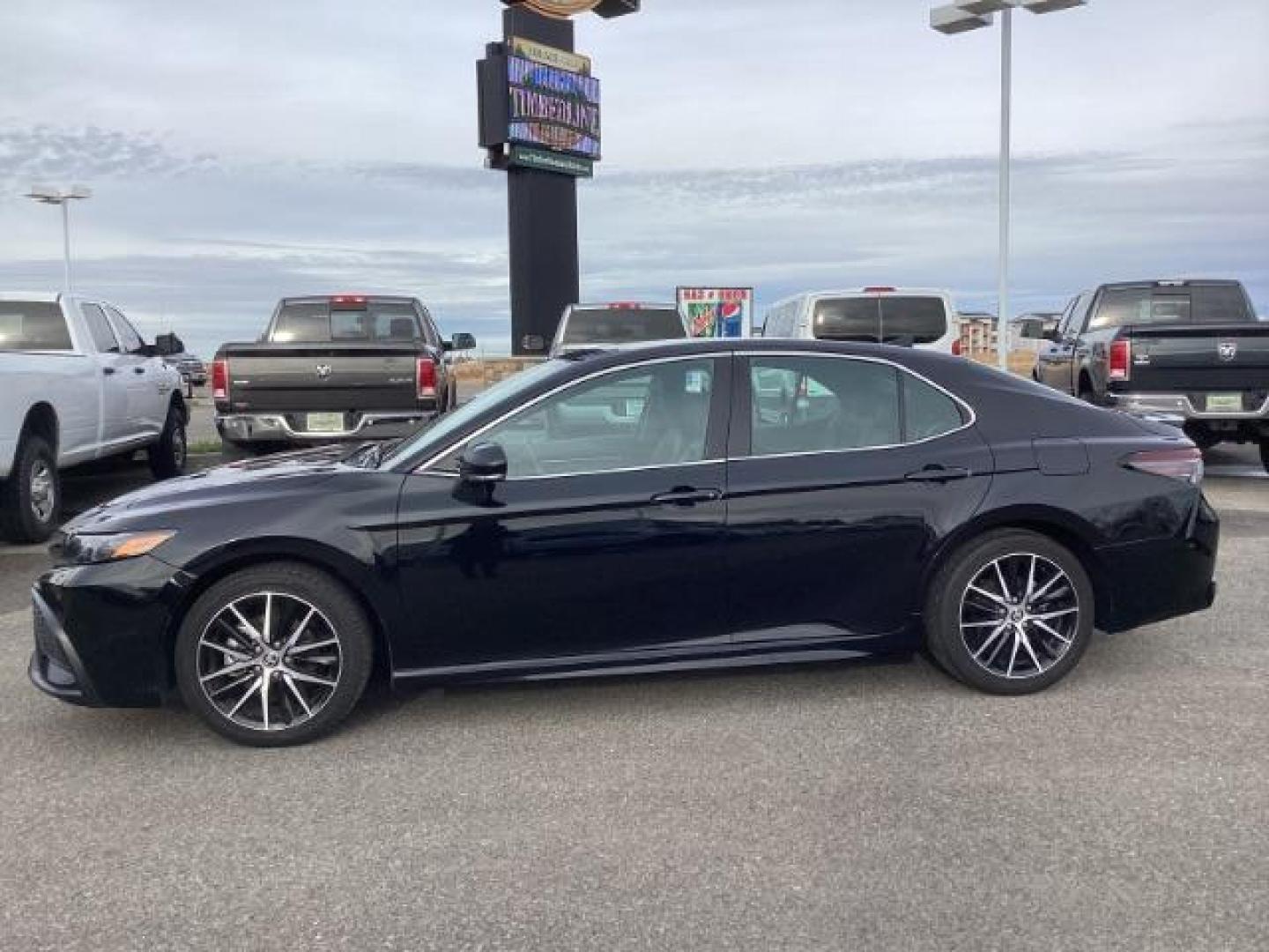2023 Midnight Black Metallic /Black Toyota Camry SE (4T1G11AKXPU) with an 2.5L L4 DOHC 16V engine, 8-Speed Automatic transmission, located at 1235 N Woodruff Ave., Idaho Falls, 83401, (208) 523-1053, 43.507172, -112.000488 - At Timberline Auto, finding a great deal on your next vehicle is always easy! Our experienced sales staff's goal is to help find you the right vehicle at the right price! Our knowledgeable finance department has options for almost any credit score. We offer extended service contract options to prote - Photo#2
