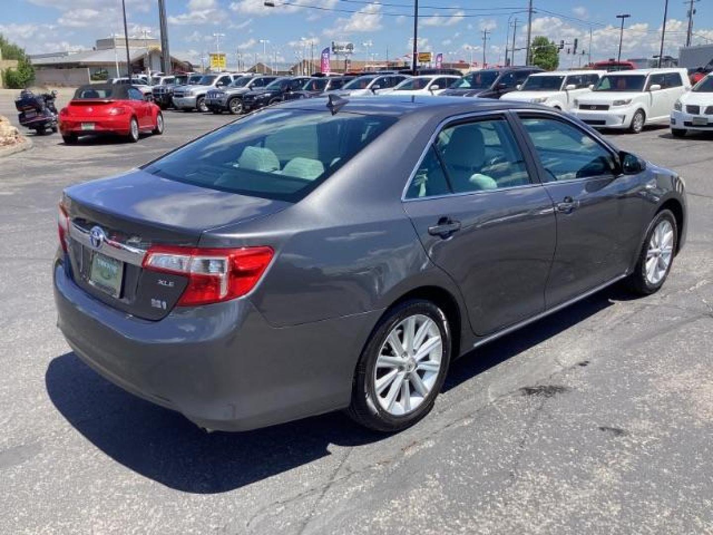 2013 GRAY Toyota Camry Hybrid SEDAN 4-DR (4T1BD1FK0DU) with an 2.5L L4 DOHC 16V HYBRID engine, Continuously Variable Transmission transmission, located at 1235 N Woodruff Ave., Idaho Falls, 83401, (208) 523-1053, 43.507172, -112.000488 - The 2013 Toyota Camry Hybrid XLE is a mid-size sedan that combines the fuel efficiency of a hybrid powertrain with the comfort and features of a premium trim level. Here are the key features of the 2013 Toyota Camry Hybrid XLE: Engine and Performance Engine: 2.5-liter 4-cylinder engine paired with a - Photo#3