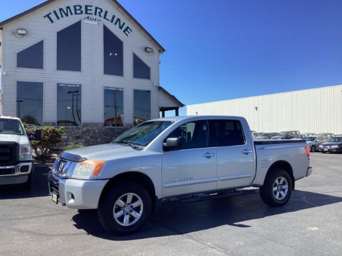 2009 Nissan Titan SE Crew Cab 4WD SWB (1N6AA07C29N) with an 5.6L V8 DOHC 32V engine, 5-Speed Automatic transmission, located at 1235 N Woodruff Ave., Idaho Falls, 83401, (208) 523-1053, 43.507172, -112.000488 - ChatGPT The 2009 Nissan Titan SE 4x4 was a rugged and capable full-size pickup truck that offered a variety of features suitable for both work and everyday use. Here are some of the common features found on the 2009 Nissan Titan SE 4x4: Engine: The Titan SE 4x4 typically came equipped with a powerf - Photo#0