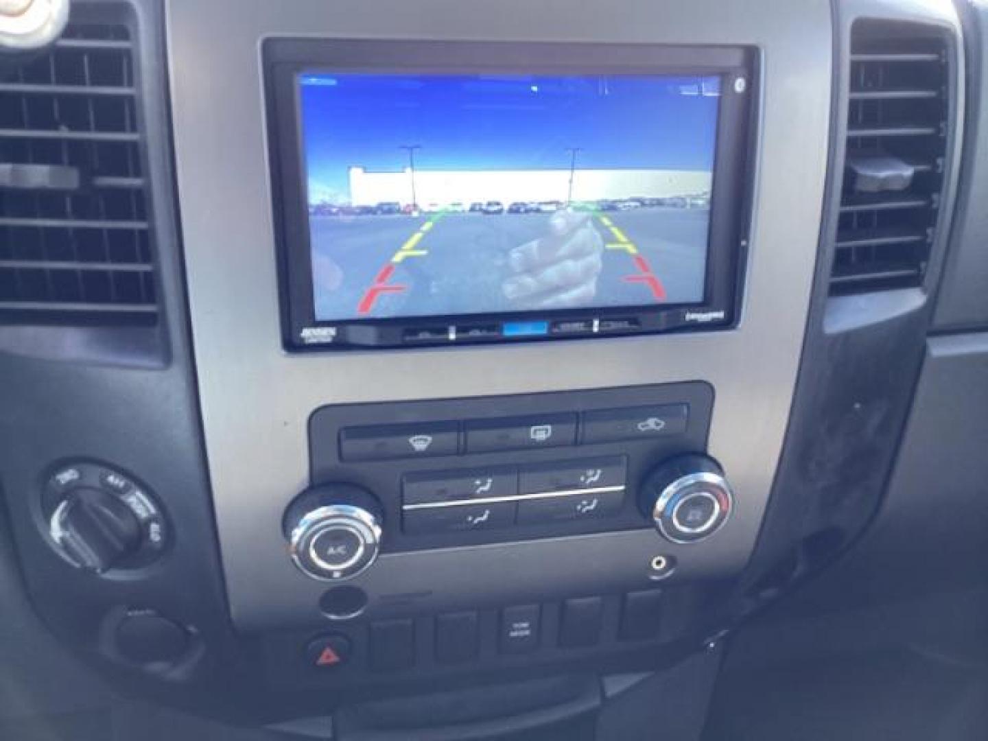 2009 Nissan Titan SE Crew Cab 4WD SWB (1N6AA07C29N) with an 5.6L V8 DOHC 32V engine, 5-Speed Automatic transmission, located at 1235 N Woodruff Ave., Idaho Falls, 83401, (208) 523-1053, 43.507172, -112.000488 - ChatGPT The 2009 Nissan Titan SE 4x4 was a rugged and capable full-size pickup truck that offered a variety of features suitable for both work and everyday use. Here are some of the common features found on the 2009 Nissan Titan SE 4x4: Engine: The Titan SE 4x4 typically came equipped with a powerf - Photo#9