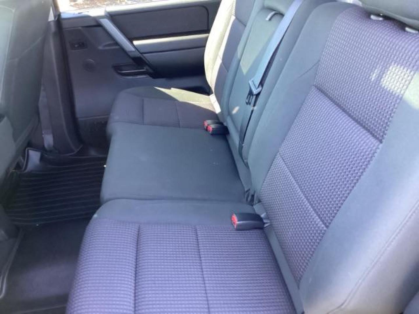 2009 Nissan Titan SE Crew Cab 4WD SWB (1N6AA07C29N) with an 5.6L V8 DOHC 32V engine, 5-Speed Automatic transmission, located at 1235 N Woodruff Ave., Idaho Falls, 83401, (208) 523-1053, 43.507172, -112.000488 - ChatGPT The 2009 Nissan Titan SE 4x4 was a rugged and capable full-size pickup truck that offered a variety of features suitable for both work and everyday use. Here are some of the common features found on the 2009 Nissan Titan SE 4x4: Engine: The Titan SE 4x4 typically came equipped with a powerf - Photo#13