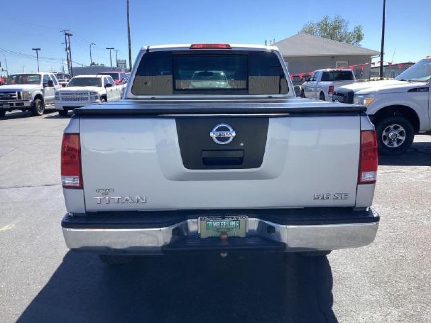 2009 Nissan Titan SE Crew Cab 4WD SWB (1N6AA07C29N) with an 5.6L V8 DOHC 32V engine, 5-Speed Automatic transmission, located at 1235 N Woodruff Ave., Idaho Falls, 83401, (208) 523-1053, 43.507172, -112.000488 - ChatGPT The 2009 Nissan Titan SE 4x4 was a rugged and capable full-size pickup truck that offered a variety of features suitable for both work and everyday use. Here are some of the common features found on the 2009 Nissan Titan SE 4x4: Engine: The Titan SE 4x4 typically came equipped with a powerf - Photo#3