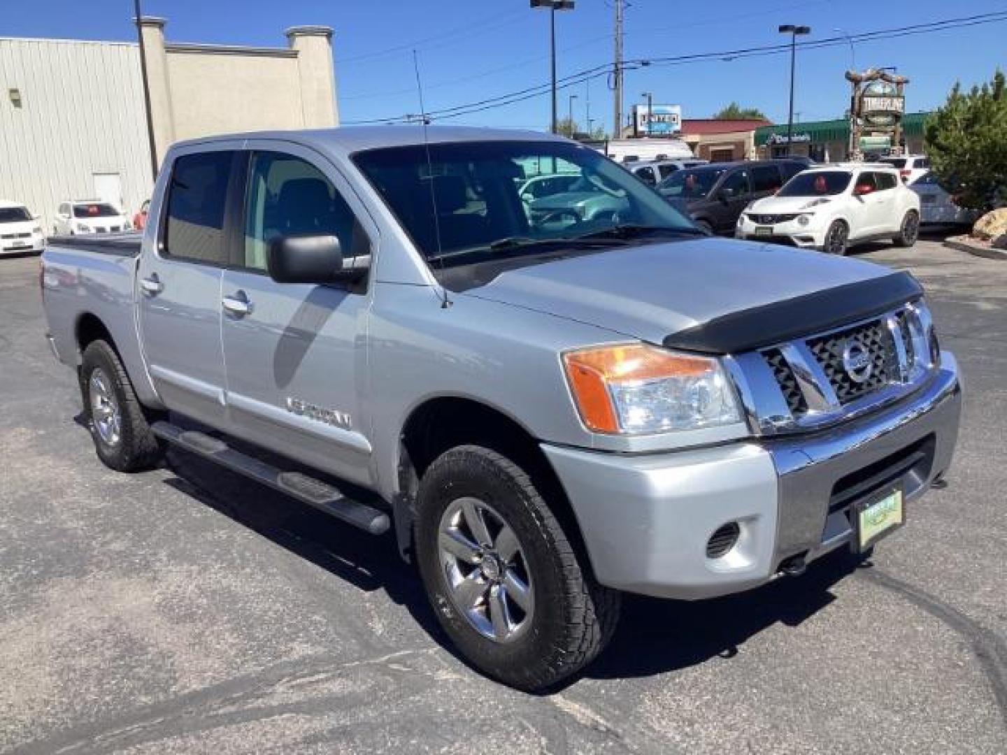 2009 Nissan Titan SE Crew Cab 4WD SWB (1N6AA07C29N) with an 5.6L V8 DOHC 32V engine, 5-Speed Automatic transmission, located at 1235 N Woodruff Ave., Idaho Falls, 83401, (208) 523-1053, 43.507172, -112.000488 - ChatGPT The 2009 Nissan Titan SE 4x4 was a rugged and capable full-size pickup truck that offered a variety of features suitable for both work and everyday use. Here are some of the common features found on the 2009 Nissan Titan SE 4x4: Engine: The Titan SE 4x4 typically came equipped with a powerf - Photo#5