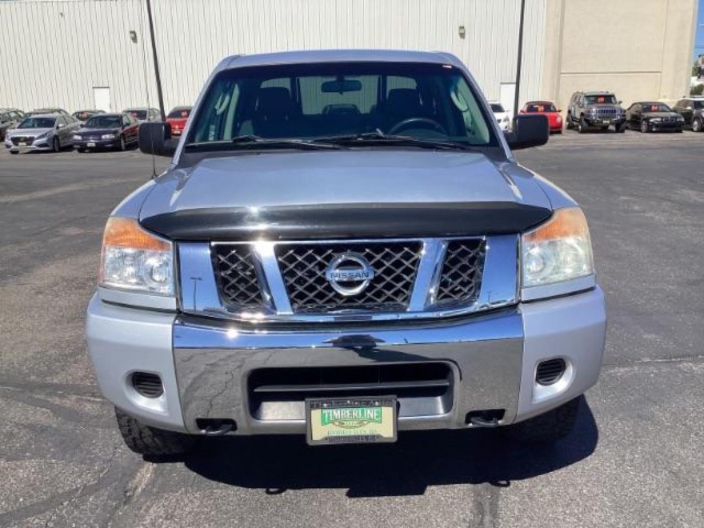 2009 Nissan Titan SE Crew Cab 4WD SWB (1N6AA07C29N) with an 5.6L V8 DOHC 32V engine, 5-Speed Automatic transmission, located at 1235 N Woodruff Ave., Idaho Falls, 83401, (208) 523-1053, 43.507172, -112.000488 - ChatGPT The 2009 Nissan Titan SE 4x4 was a rugged and capable full-size pickup truck that offered a variety of features suitable for both work and everyday use. Here are some of the common features found on the 2009 Nissan Titan SE 4x4: Engine: The Titan SE 4x4 typically came equipped with a powerf - Photo#6
