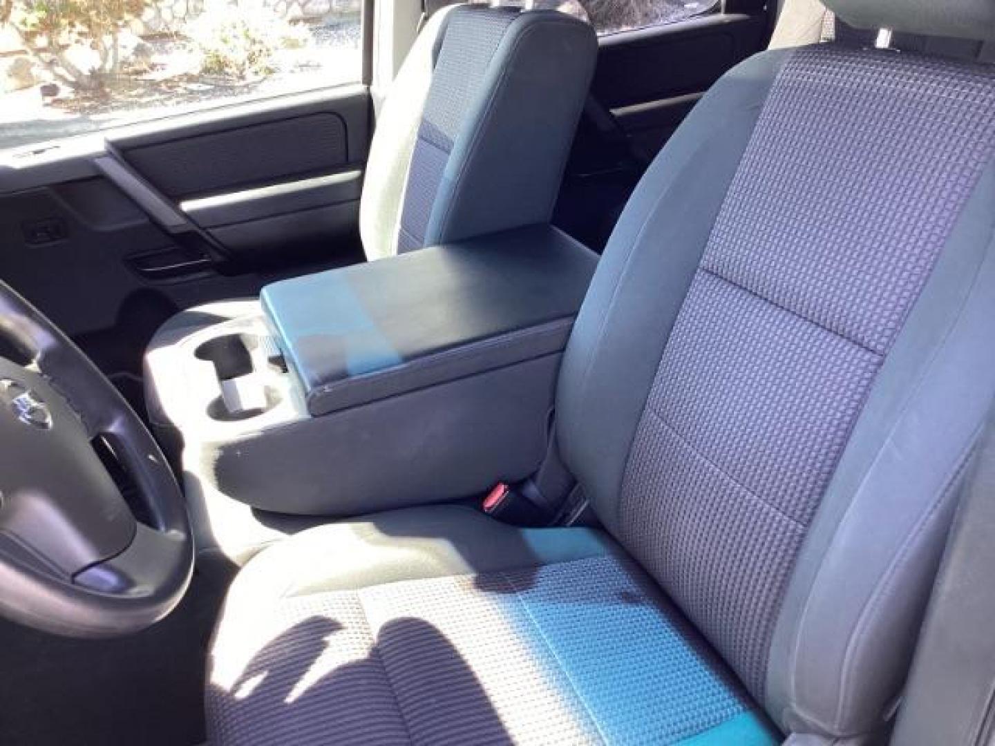 2009 Nissan Titan SE Crew Cab 4WD SWB (1N6AA07C29N) with an 5.6L V8 DOHC 32V engine, 5-Speed Automatic transmission, located at 1235 N Woodruff Ave., Idaho Falls, 83401, (208) 523-1053, 43.507172, -112.000488 - ChatGPT The 2009 Nissan Titan SE 4x4 was a rugged and capable full-size pickup truck that offered a variety of features suitable for both work and everyday use. Here are some of the common features found on the 2009 Nissan Titan SE 4x4: Engine: The Titan SE 4x4 typically came equipped with a powerf - Photo#7