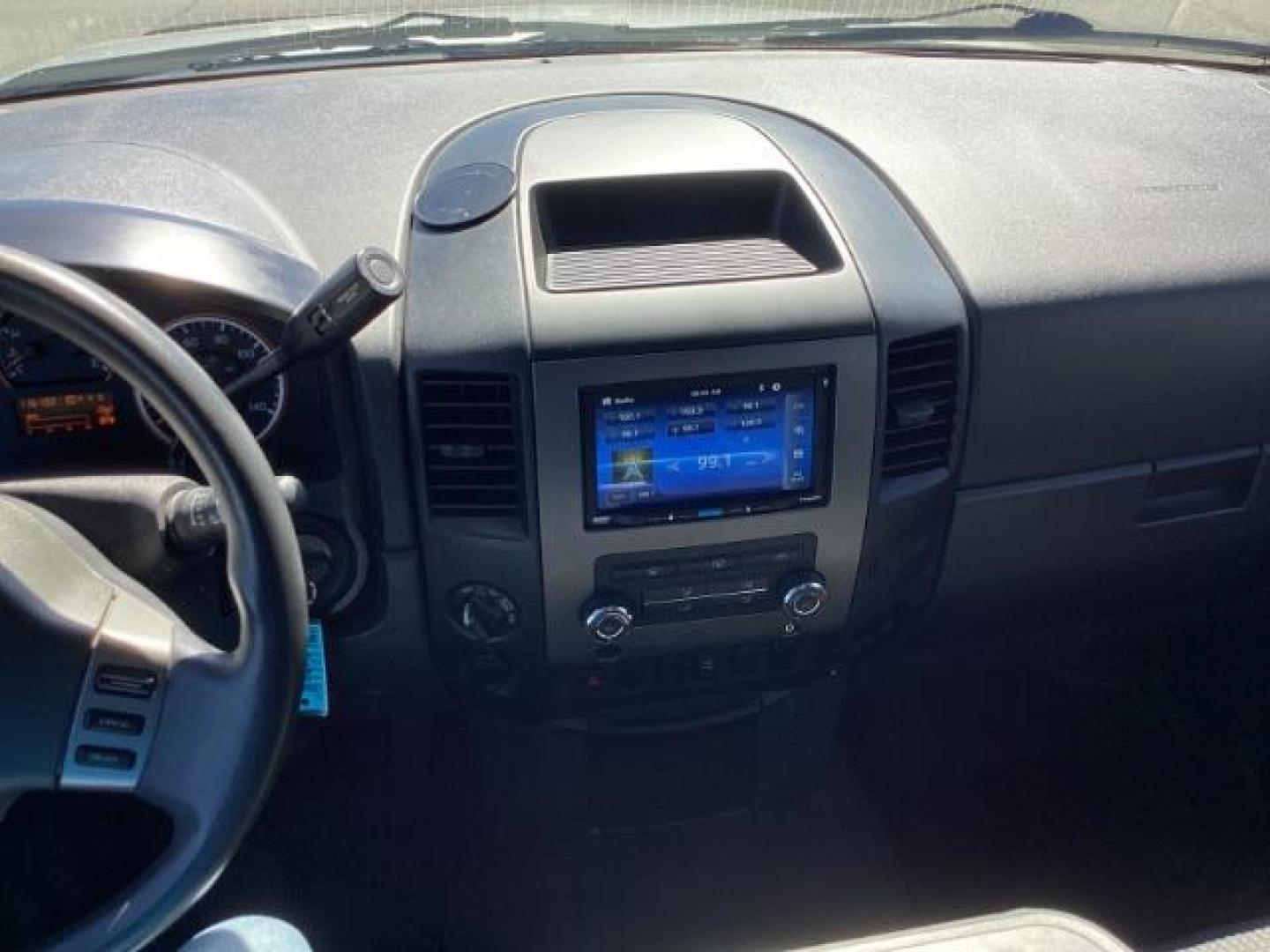 2009 Nissan Titan SE Crew Cab 4WD SWB (1N6AA07C29N) with an 5.6L V8 DOHC 32V engine, 5-Speed Automatic transmission, located at 1235 N Woodruff Ave., Idaho Falls, 83401, (208) 523-1053, 43.507172, -112.000488 - ChatGPT The 2009 Nissan Titan SE 4x4 was a rugged and capable full-size pickup truck that offered a variety of features suitable for both work and everyday use. Here are some of the common features found on the 2009 Nissan Titan SE 4x4: Engine: The Titan SE 4x4 typically came equipped with a powerf - Photo#8