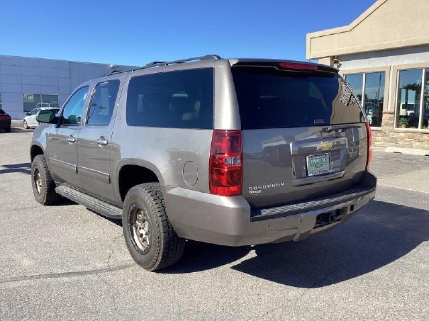 2013 GRAY /Ebony Leather Interior Chevrolet Suburban LTZ 1500 4WD (1GNSKJE71DR) with an 5.3L V8 OHV 16V FFV engine, 6-Speed Automatic transmission, located at 1235 N Woodruff Ave., Idaho Falls, 83401, (208) 523-1053, 43.507172, -112.000488 - At Timberline Auto, finding a great deal on your next vehicle is always easy! Our experienced sales staff's goal is to help find you the right vehicle at the right price! Our knowledgeable finance department has options for almost any credit score. We offer extended service contract options to prote - Photo#2